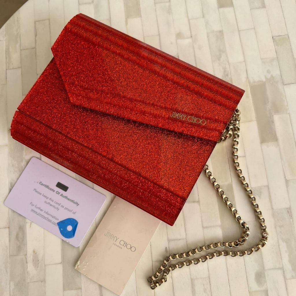 Jimmy Choo
Orange Acrylic and Leather Clutch